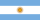 Bright Argentine flag featuring a central sun with a face on a blue and white background, representing Argentina's national symbol.