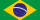 Brazilian flag with green, yellow, and blue design, featuring a white banner with "Ordem e Progresso".